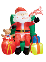 LIGHT-UP INFLATABLE SANTA CLAUS SEATED ON SOFA WITH PRESENTS